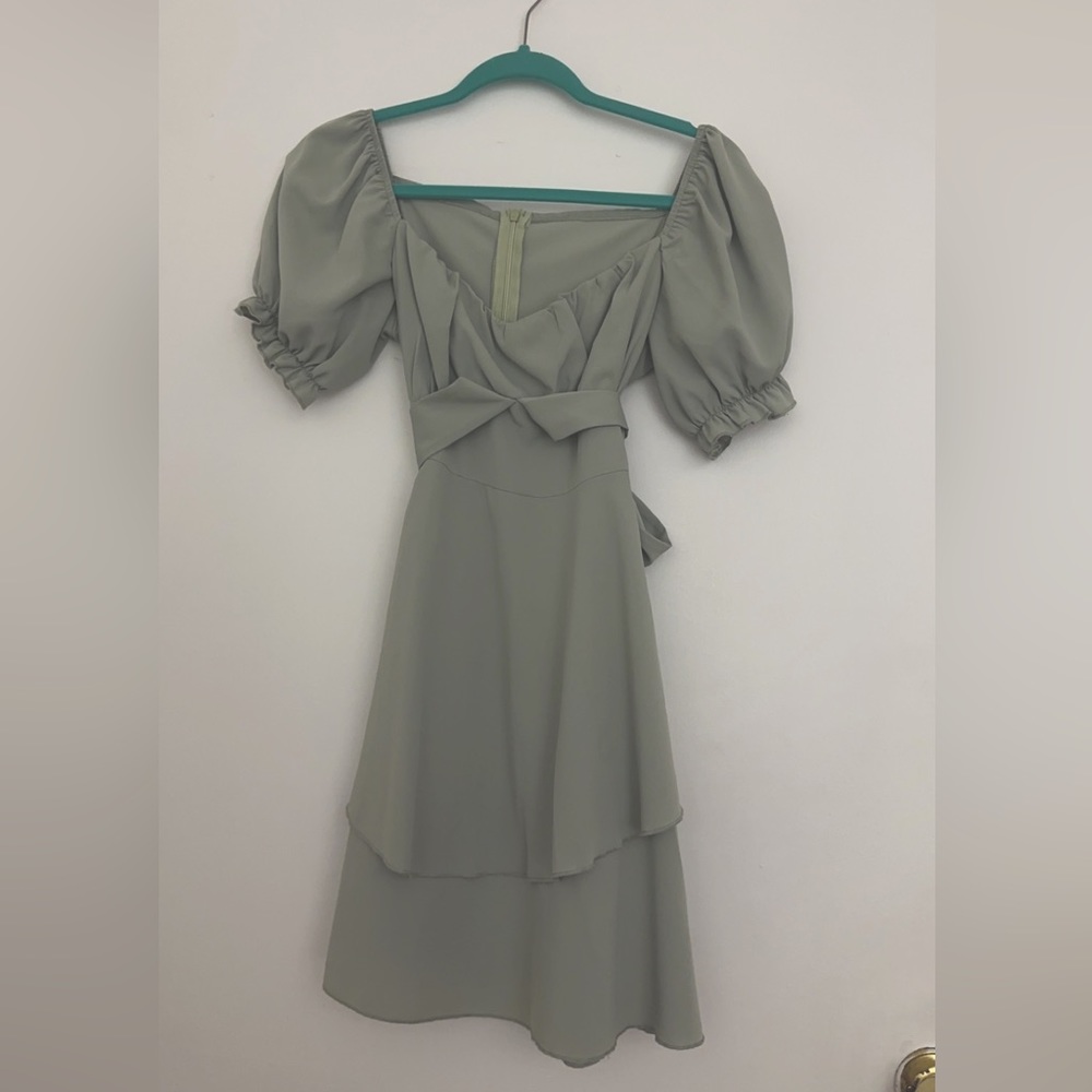 This is a high quality sage green modest dress.